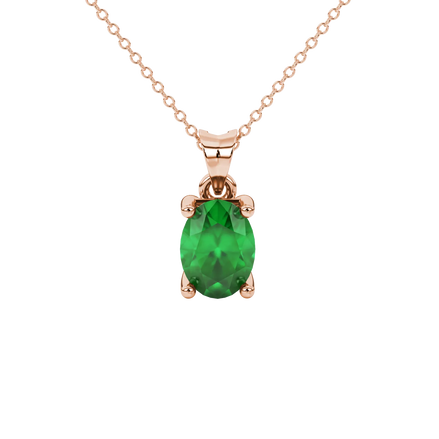 Oval cut emerald green gemstone pendant, rose gold surprise diamond setting.