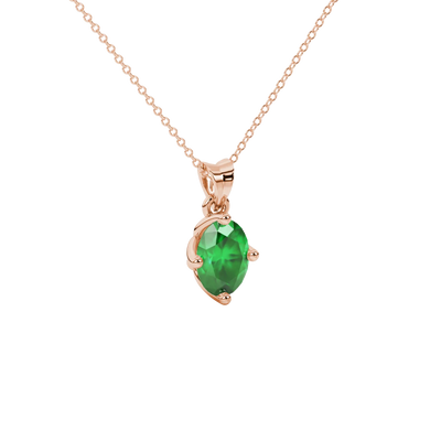 Close-up, oval cut emerald green gemstone pendant, rose gold tulip basket.