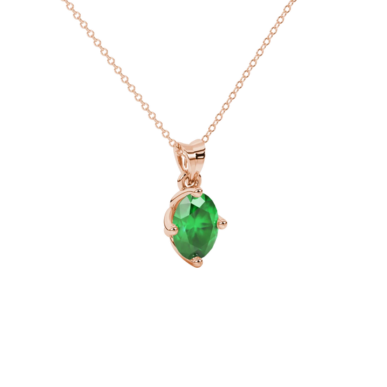 Close-up, oval cut emerald green gemstone pendant, rose gold tulip basket.