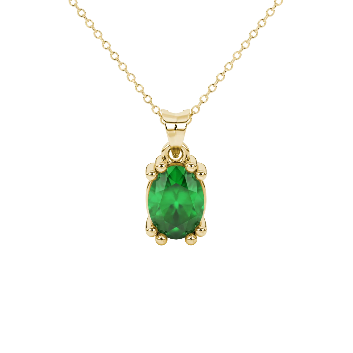 Oval cut emerald green gemstone pendant, yellow gold vintage basket setting.