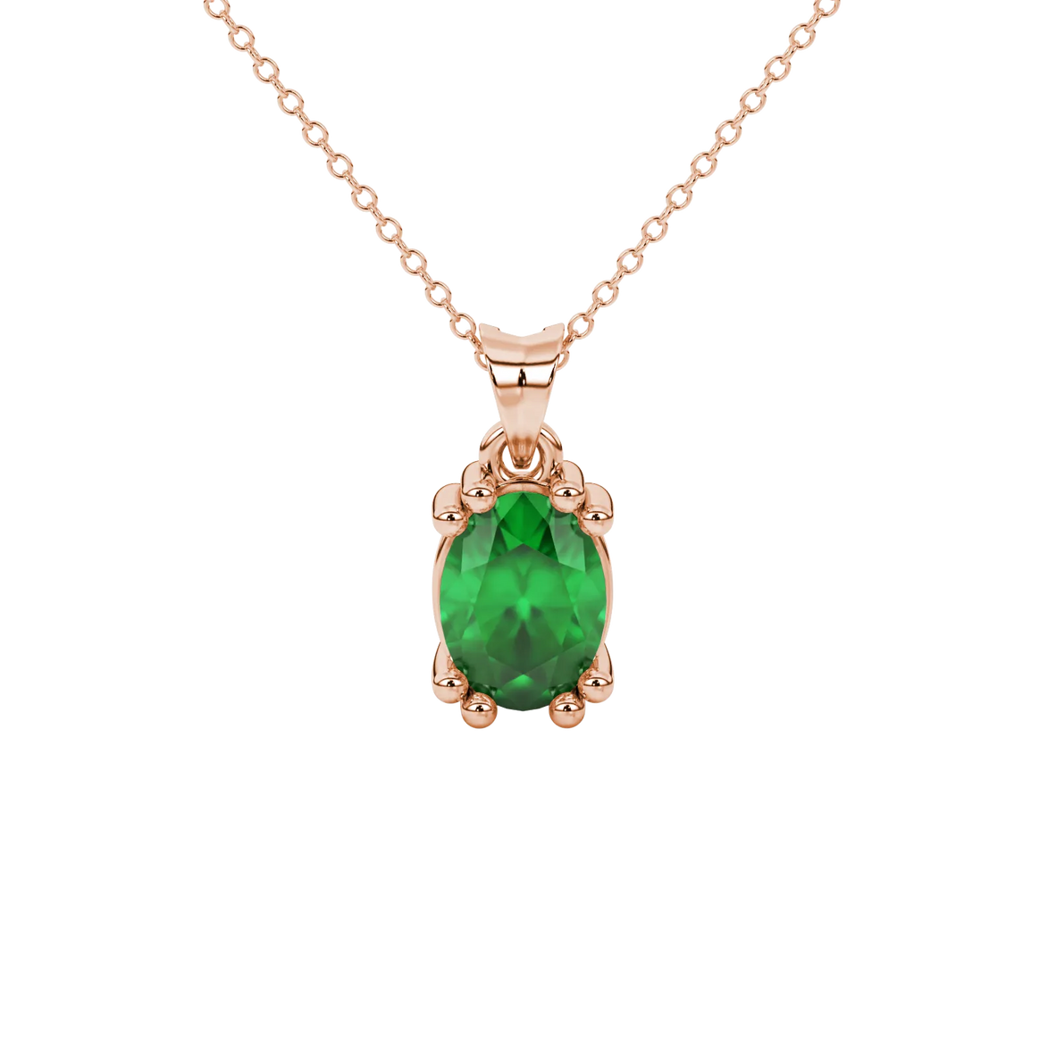 Oval cut emerald green gemstone pendant, rose gold vintage basket setting.