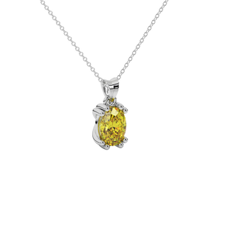 Close-up oval cut canary yellow gemstone pendant, white gold vintage basket.