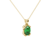 Close-up, oval cut emerald green gemstone, yellow gold vintage basket pendant.