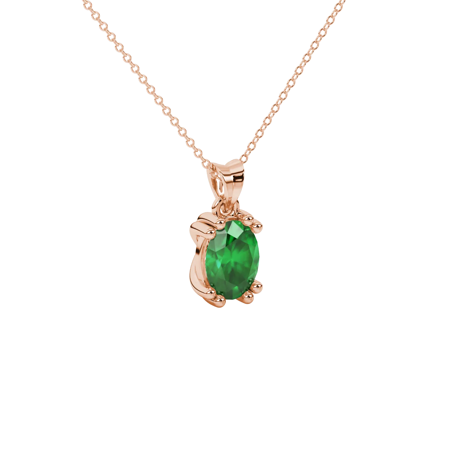 Close-up, oval cut emerald green gemstone pendant, rose gold vintage basket.