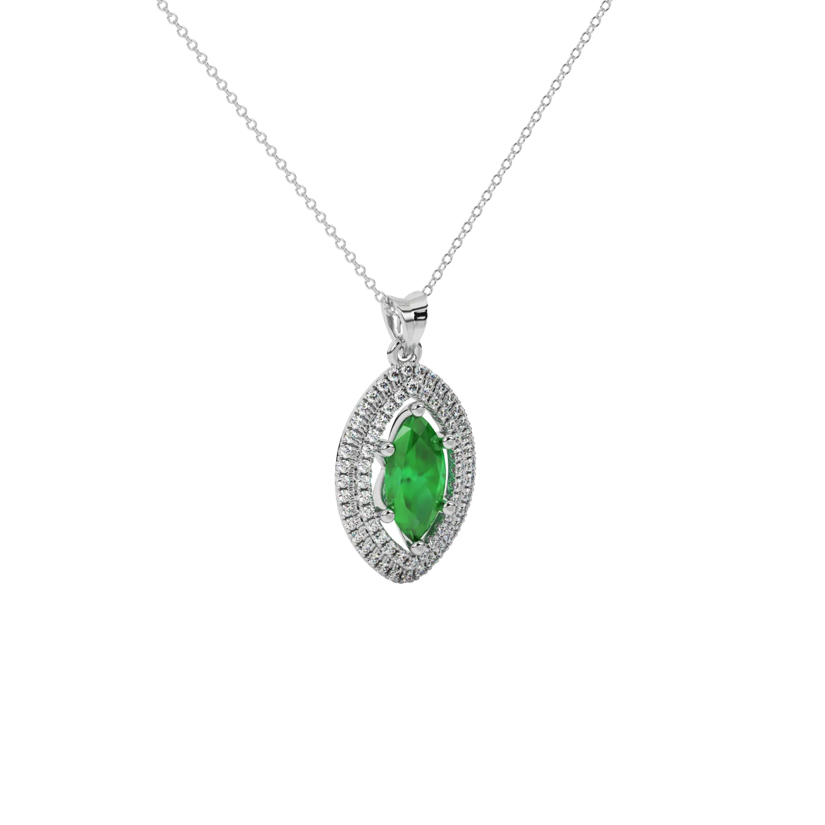 Close-up marquise cut emerald green gemstone, white gold falling edge halo.