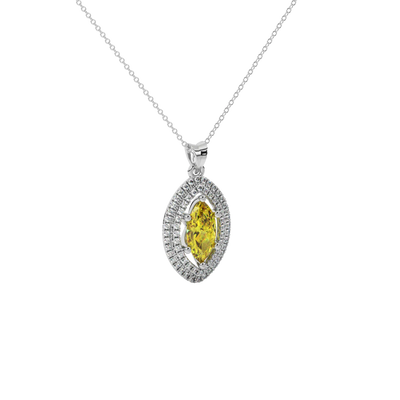 Close-up marquise cut canary yellow gemstone, white gold falling edge halo.
