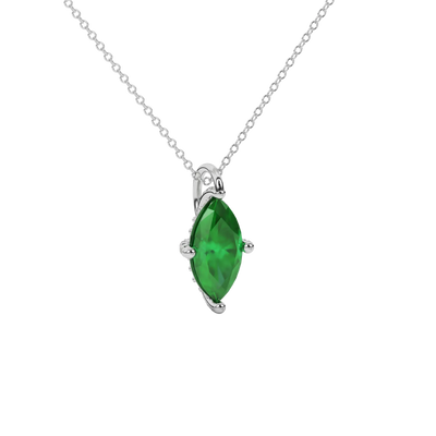 Close-up View: Macro shot, marquise cut emerald green gemstone, white gold pavé basket.