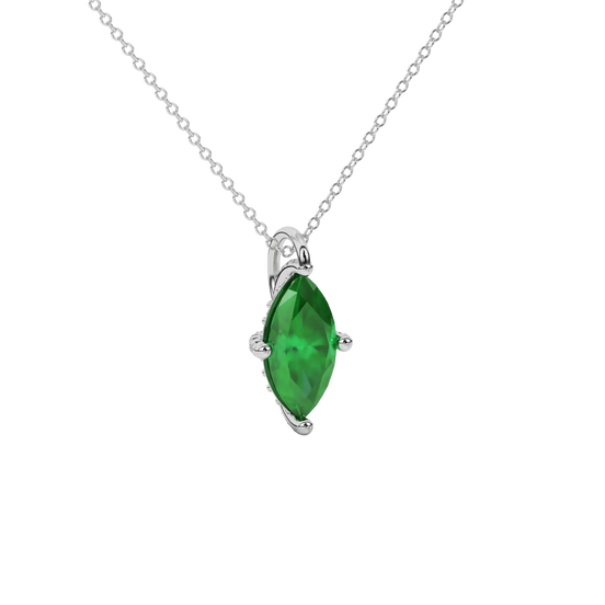 Close-up View: Macro shot, marquise cut emerald green gemstone, white gold pavé basket.