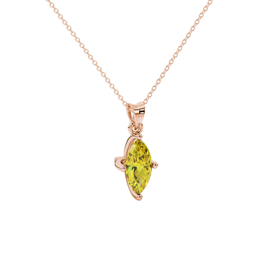 Close-up, marquise cut canary yellow gemstone pendant, rose gold surprise diamond setting.