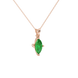 Close-up, marquise cut emerald green gemstone pendant, rose gold surprise diamond setting.