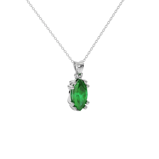 Close-up marquise cut emerald green gemstone, white gold vintage basket.