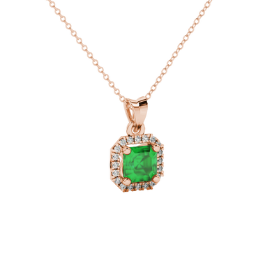 emerald green gemstone halo pendant in rose gold
