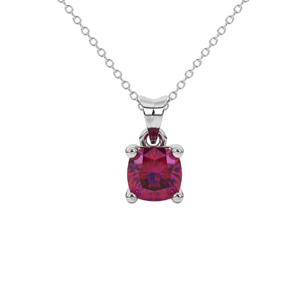 Red cushion cut gemstone solitaire pendant in gold featuring a refined four-prong basket setting