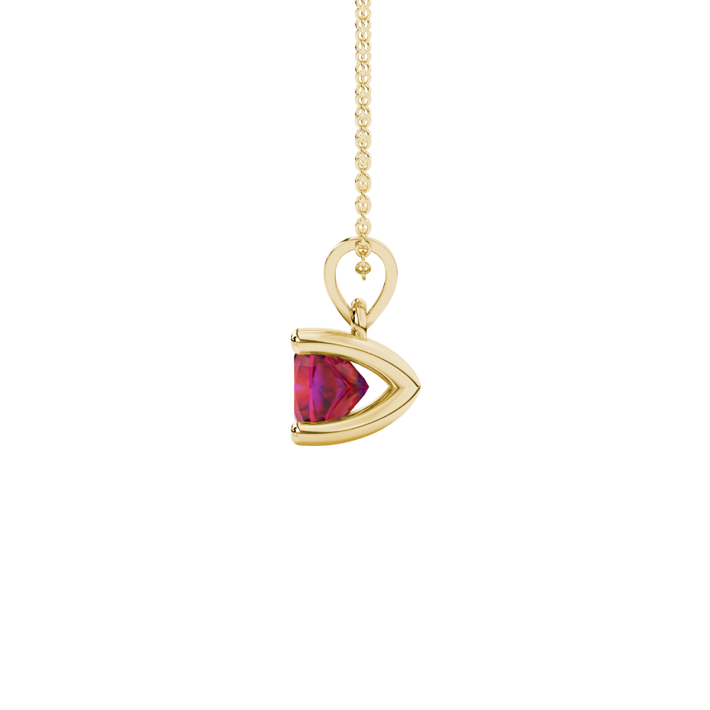 Red cushion cut gemstone solitaire pendant in gold featuring a refined four-prong basket setting