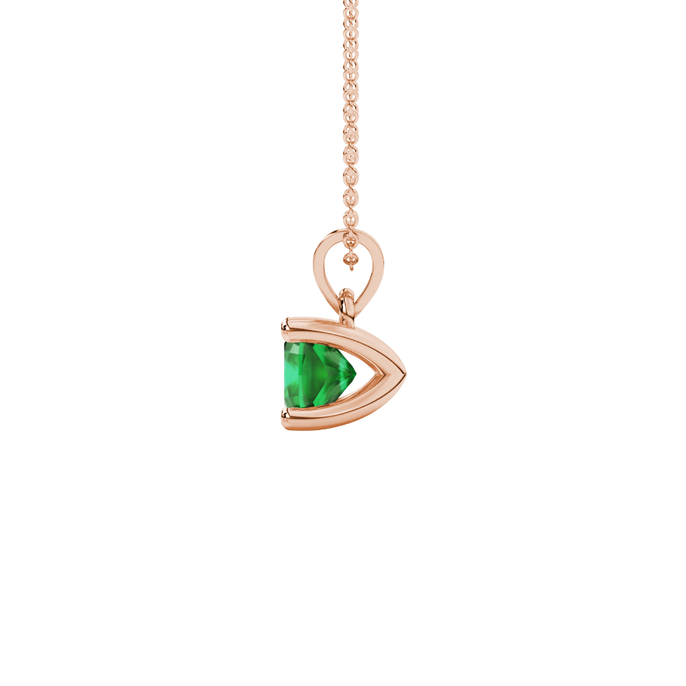 Green cushion cut gemstone solitaire pendant in gold featuring a refined four-prong basket setting