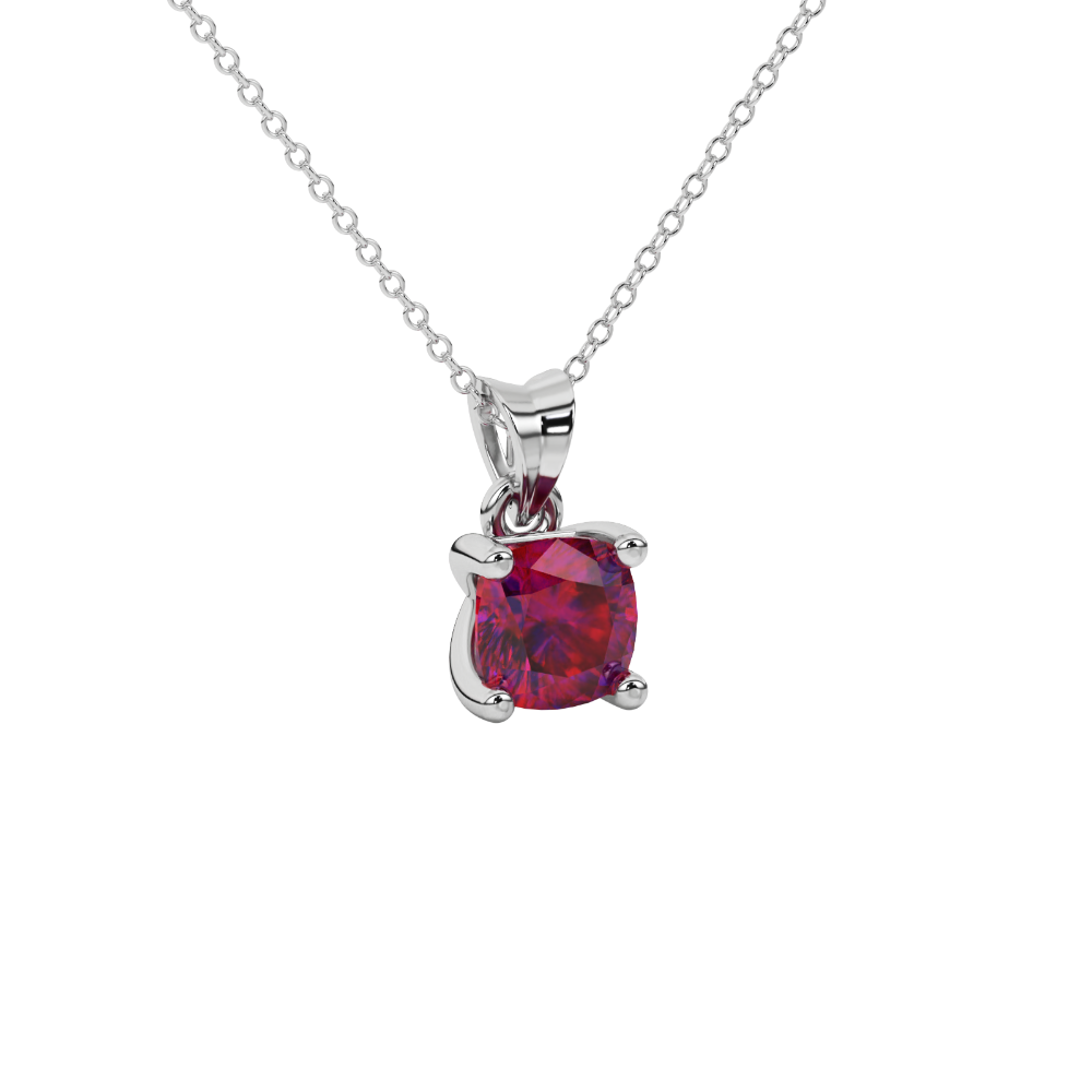 Red cushion cut gemstone solitaire pendant in gold featuring a refined four-prong basket setting