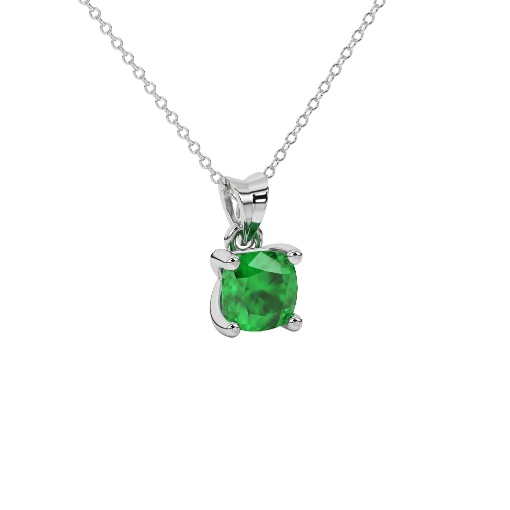 Green cushion cut gemstone solitaire pendant in gold featuring a refined four-prong basket setting