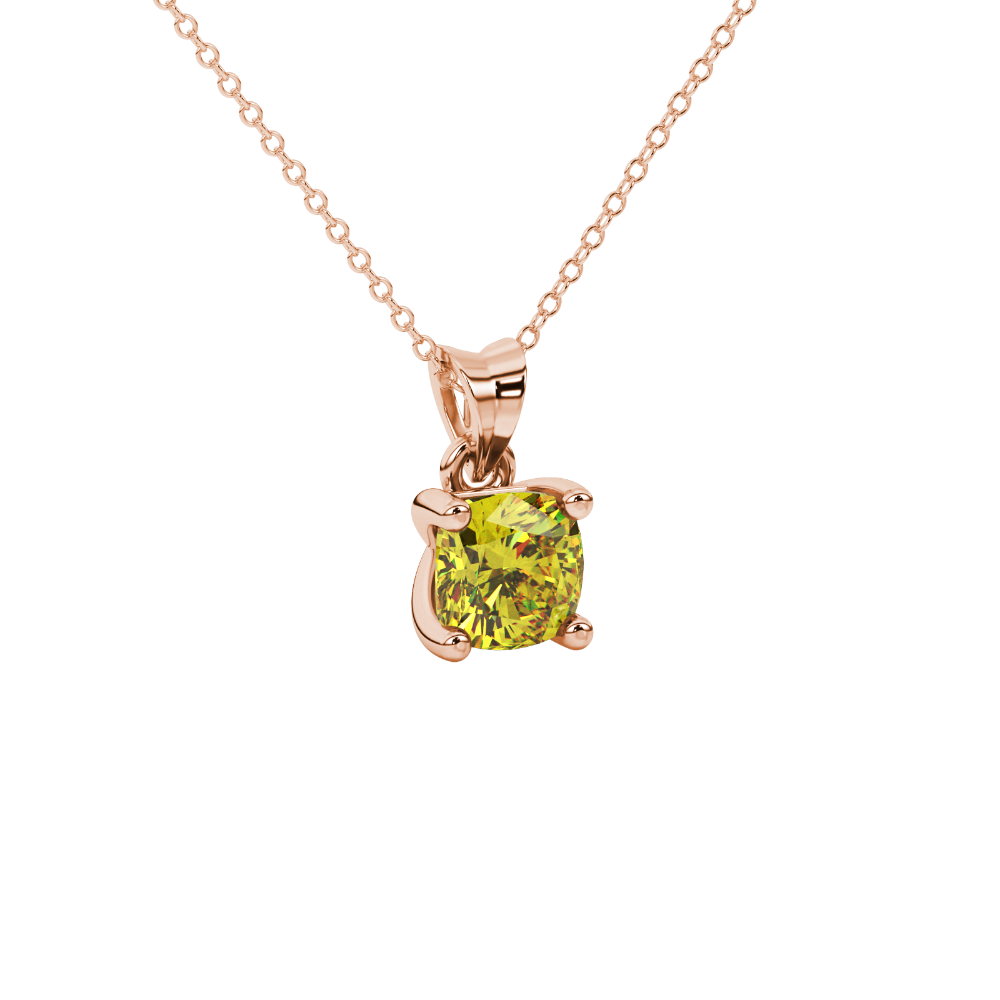 Yellow cushion cut gemstone solitaire pendant in gold featuring a refined four-prong basket setting