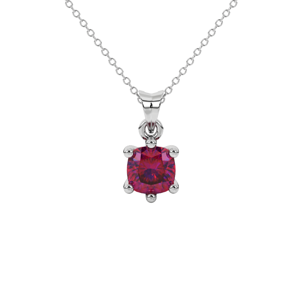Red cushion cut gemstone solitaire pendant in gold featuring a refined six-prong basket setting