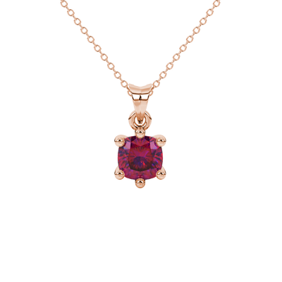 Red cushion cut gemstone solitaire pendant in gold featuring a refined six-prong basket setting