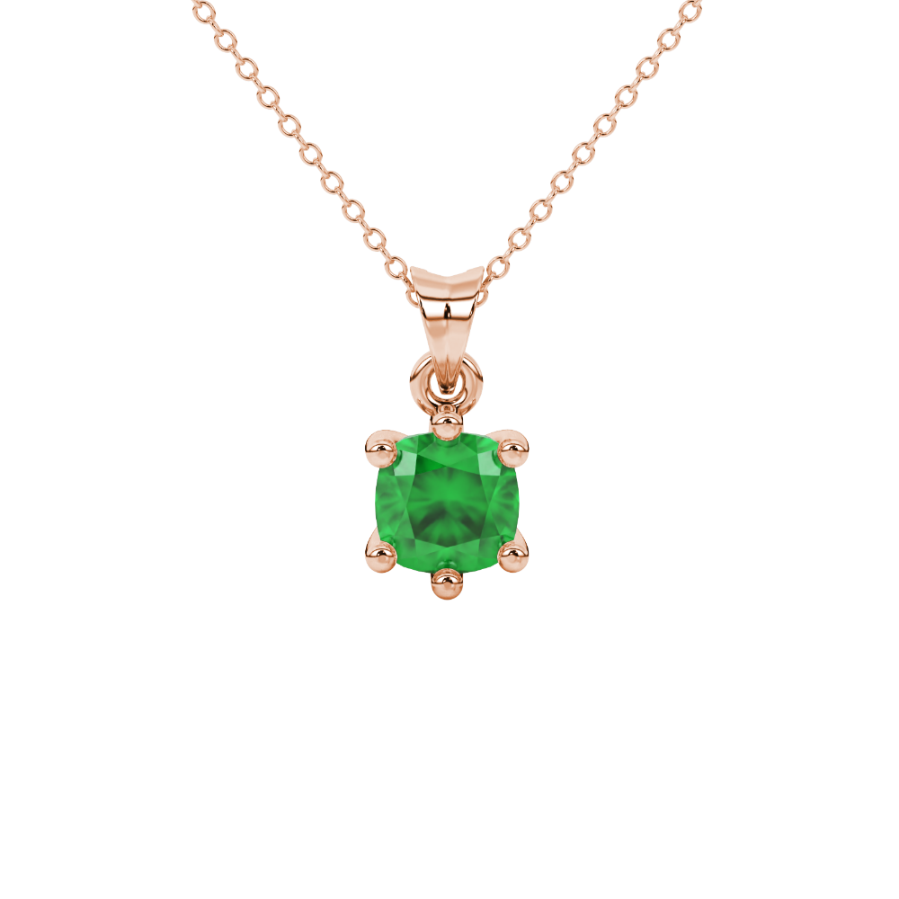 Green cushion cut gemstone solitaire pendant in gold featuring a refined six-prong basket setting