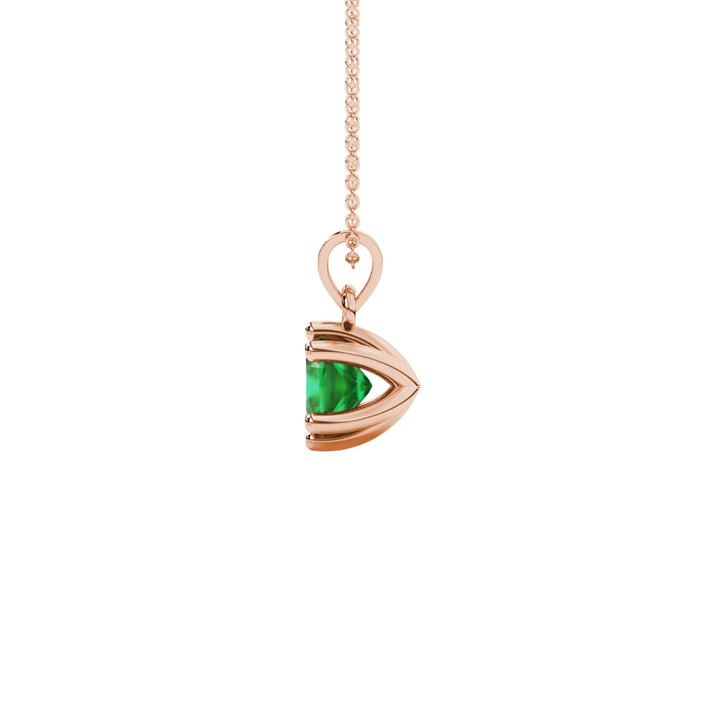 Green cushion cut gemstone solitaire pendant in gold featuring a refined six-prong basket setting