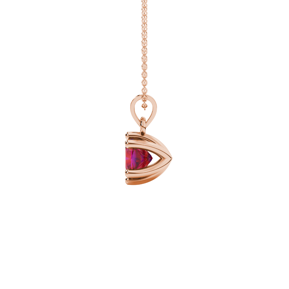 Red cushion cut gemstone solitaire pendant in gold featuring a refined six-prong basket setting