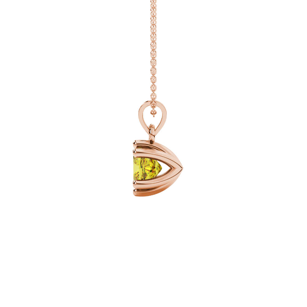 Yellow cushion cut gemstone solitaire pendant in gold featuring a refined six-prong basket setting