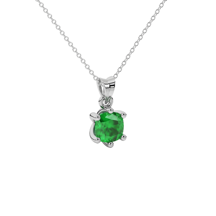 Green cushion cut gemstone solitaire pendant in gold featuring a refined six-prong basket setting