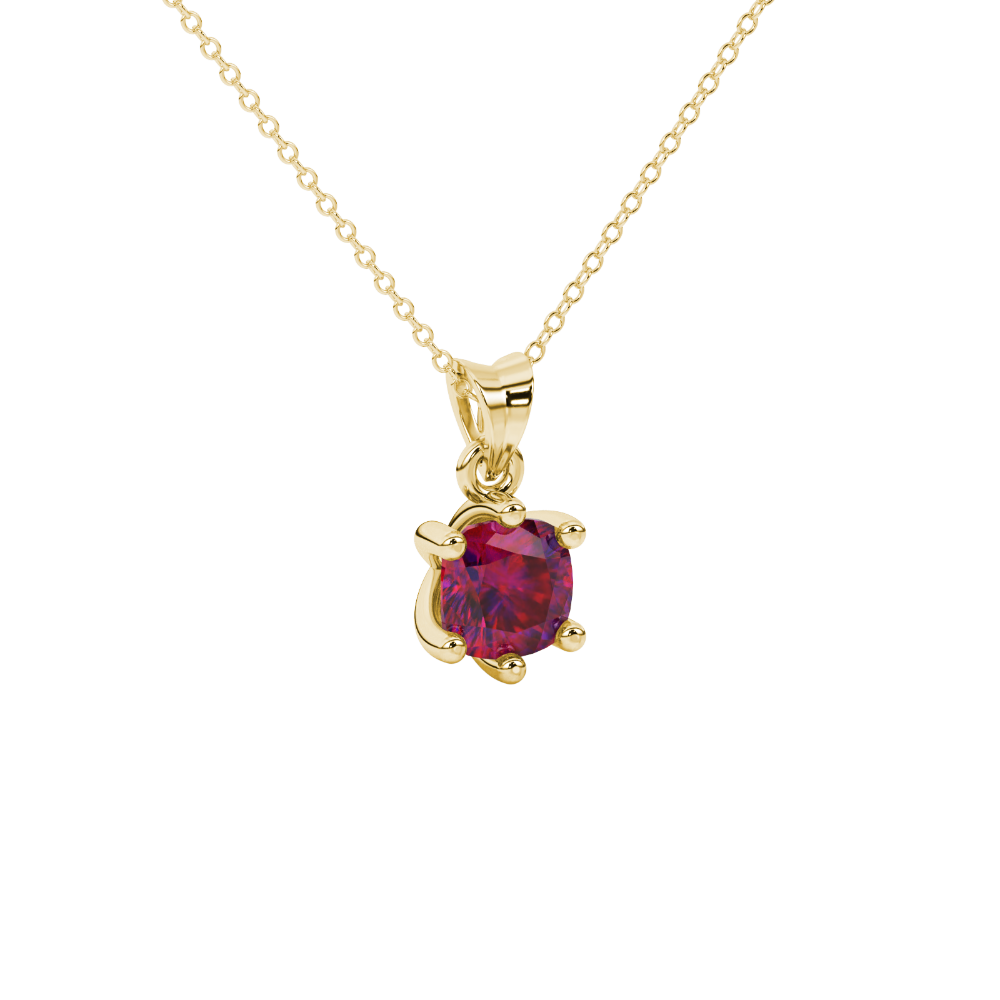 Red cushion cut gemstone solitaire pendant in gold featuring a refined six-prong basket setting
