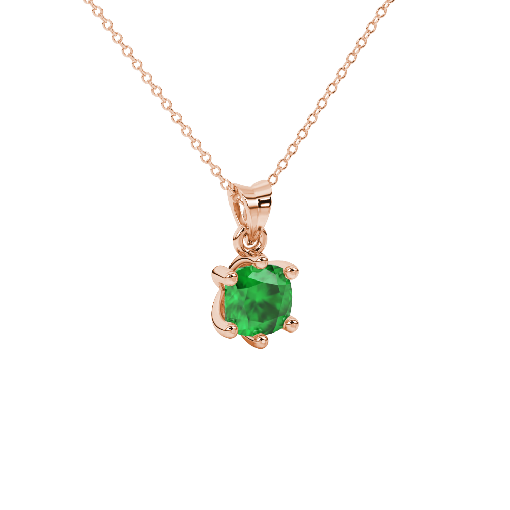 Green cushion cut gemstone solitaire pendant in gold featuring a refined six-prong basket setting