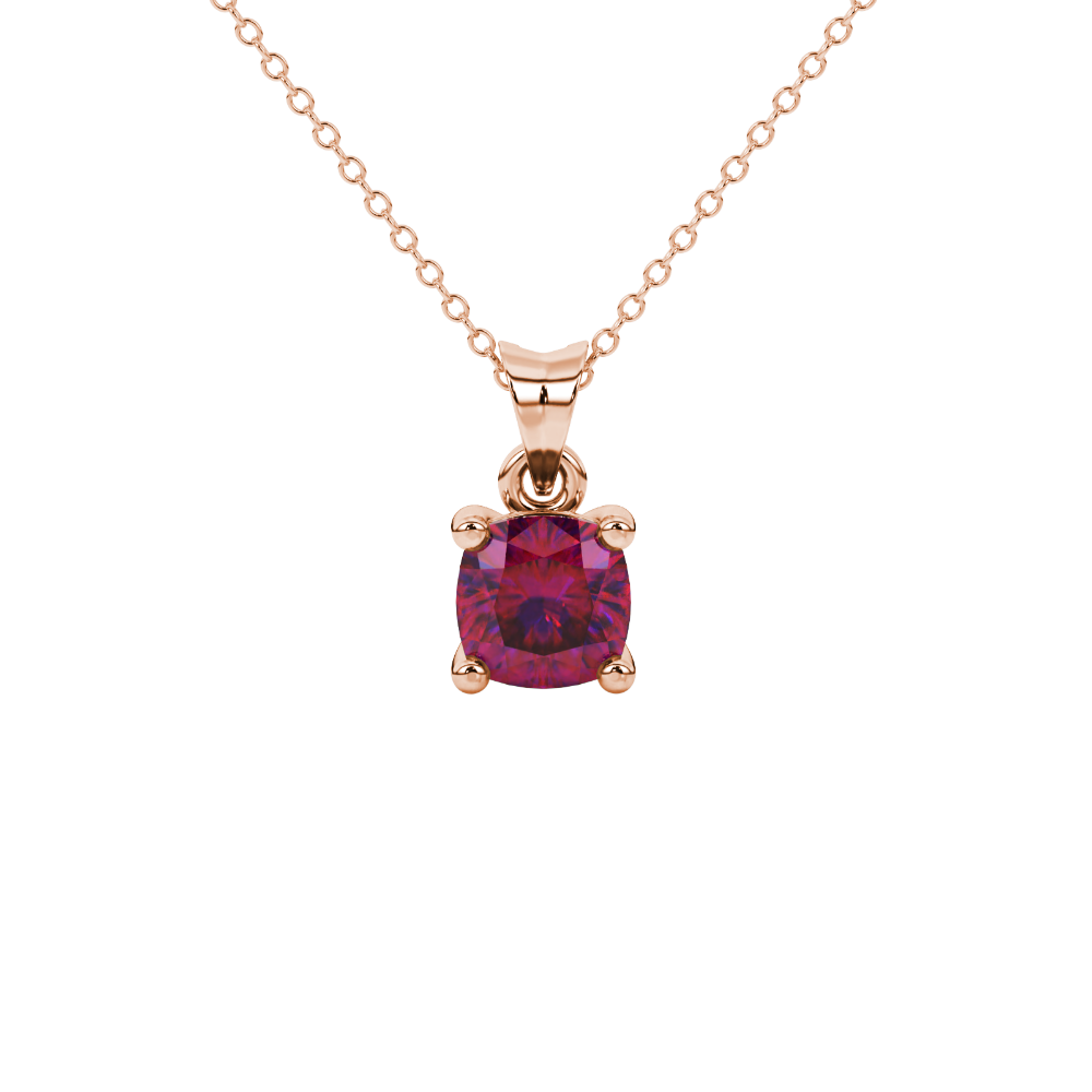 Red cushion cut solitaire gemstone pendant in yellow gold four-prong setting