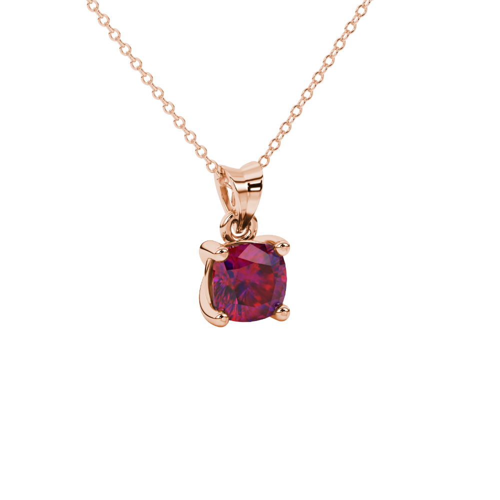 Red cushion cut solitaire gemstone pendant in yellow gold four-prong setting