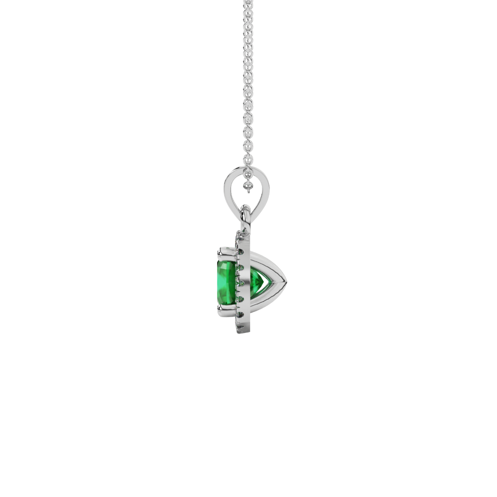 Green cushion cut gemstone halo pendant with diamond accents in gold