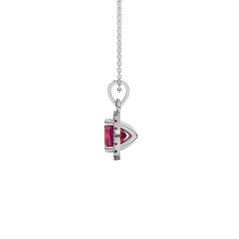 Red cushion cut gemstone halo pendant with diamond accents in gold