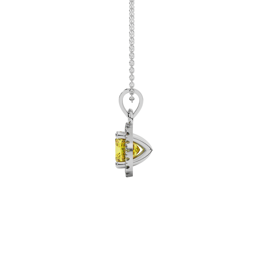 Yellow cushion cut gemstone halo pendant with diamond accents in gold