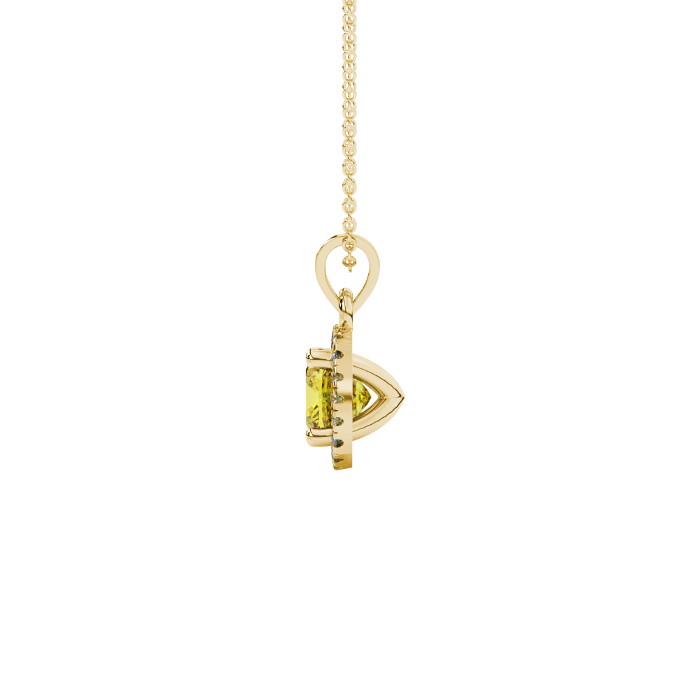 Yellow cushion cut gemstone halo pendant with diamond accents in gold