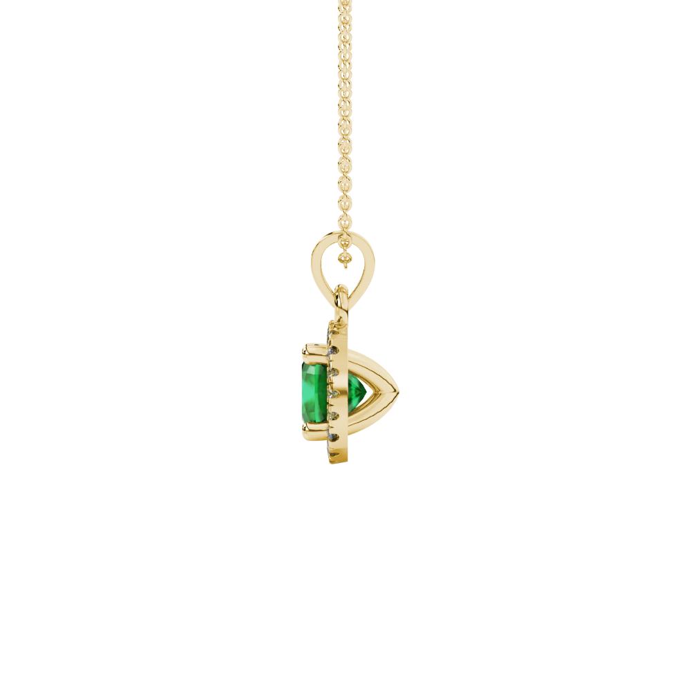 Green cushion cut gemstone halo pendant with diamond accents in gold