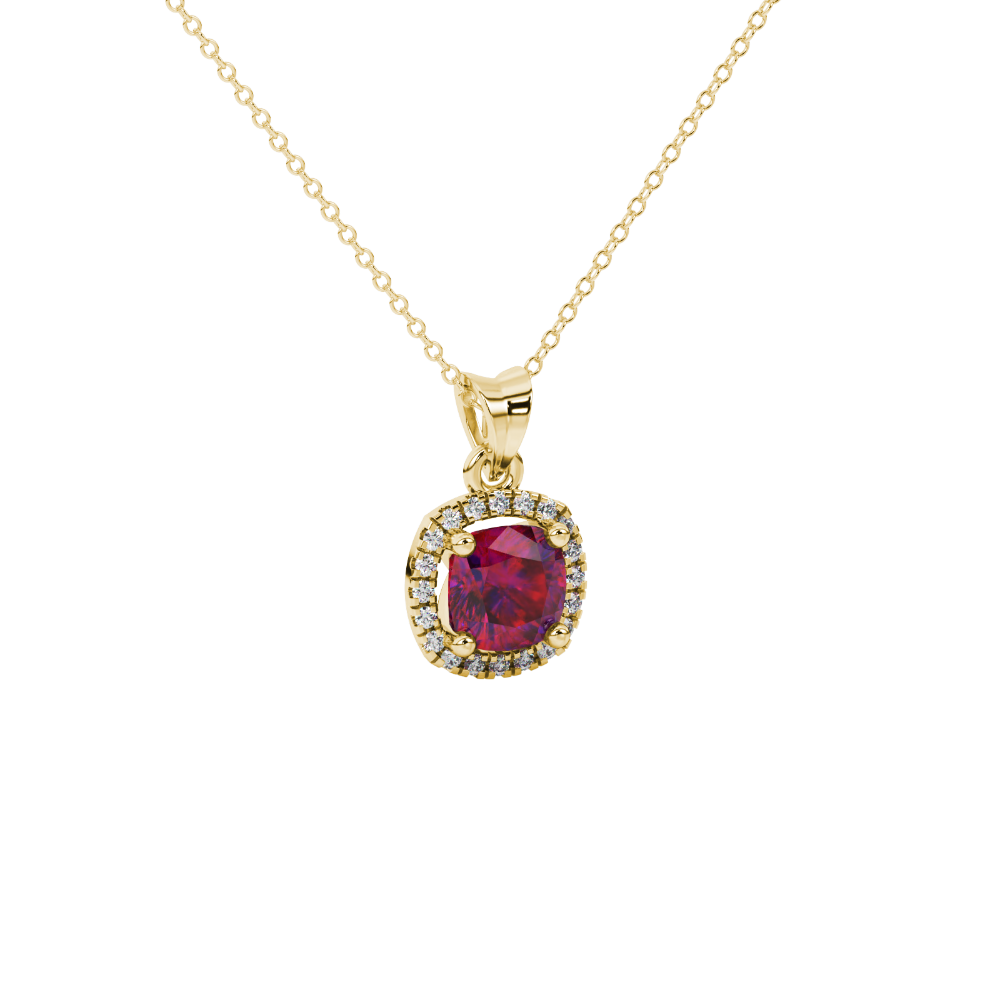 Red cushion cut gemstone halo pendant with diamond accents in gold