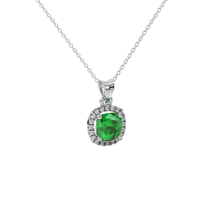 Green cushion cut gemstone halo pendant with diamond accents in gold