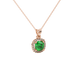 Green cushion cut gemstone halo pendant with diamond accents in gold
