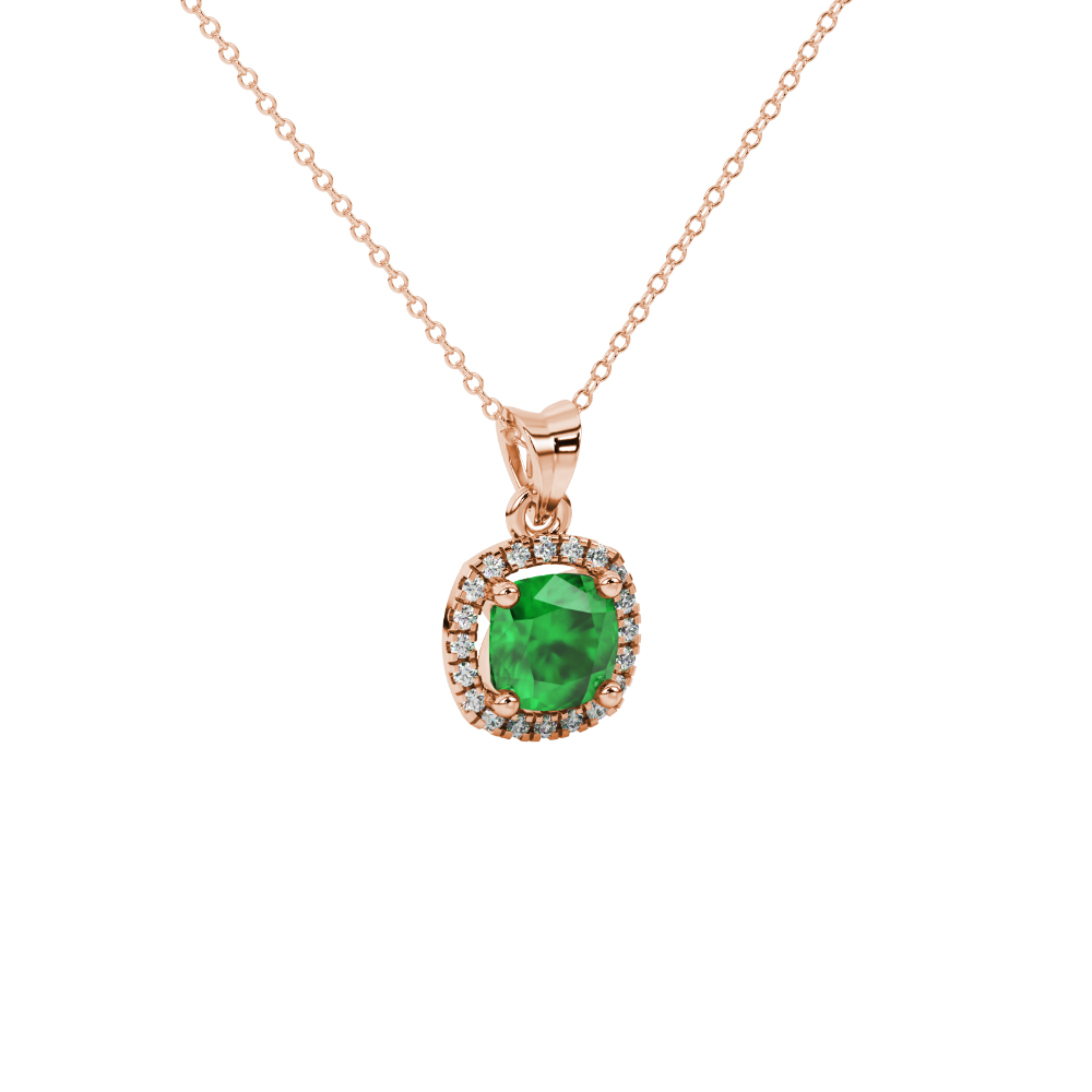 Green cushion cut gemstone halo pendant with diamond accents in gold