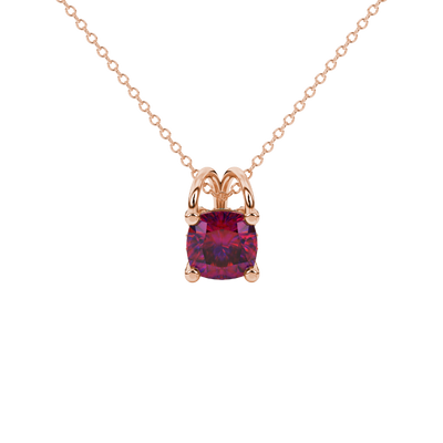 Red cushion cut gemstone pendant with diamond accent basket setting in rose gold
