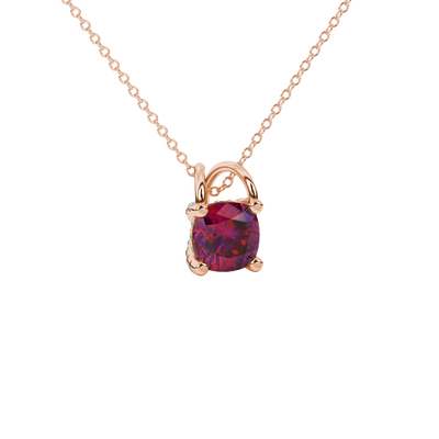 Red cushion cut gemstone pendant with diamond accent basket setting in rose gold