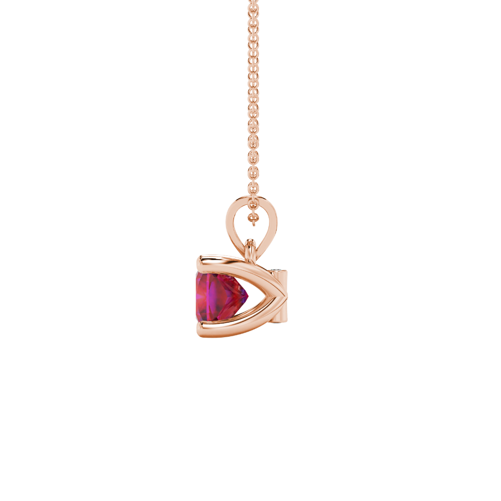 Red cushion cut gemstone pendant with accent diamonds in white gold basket setting