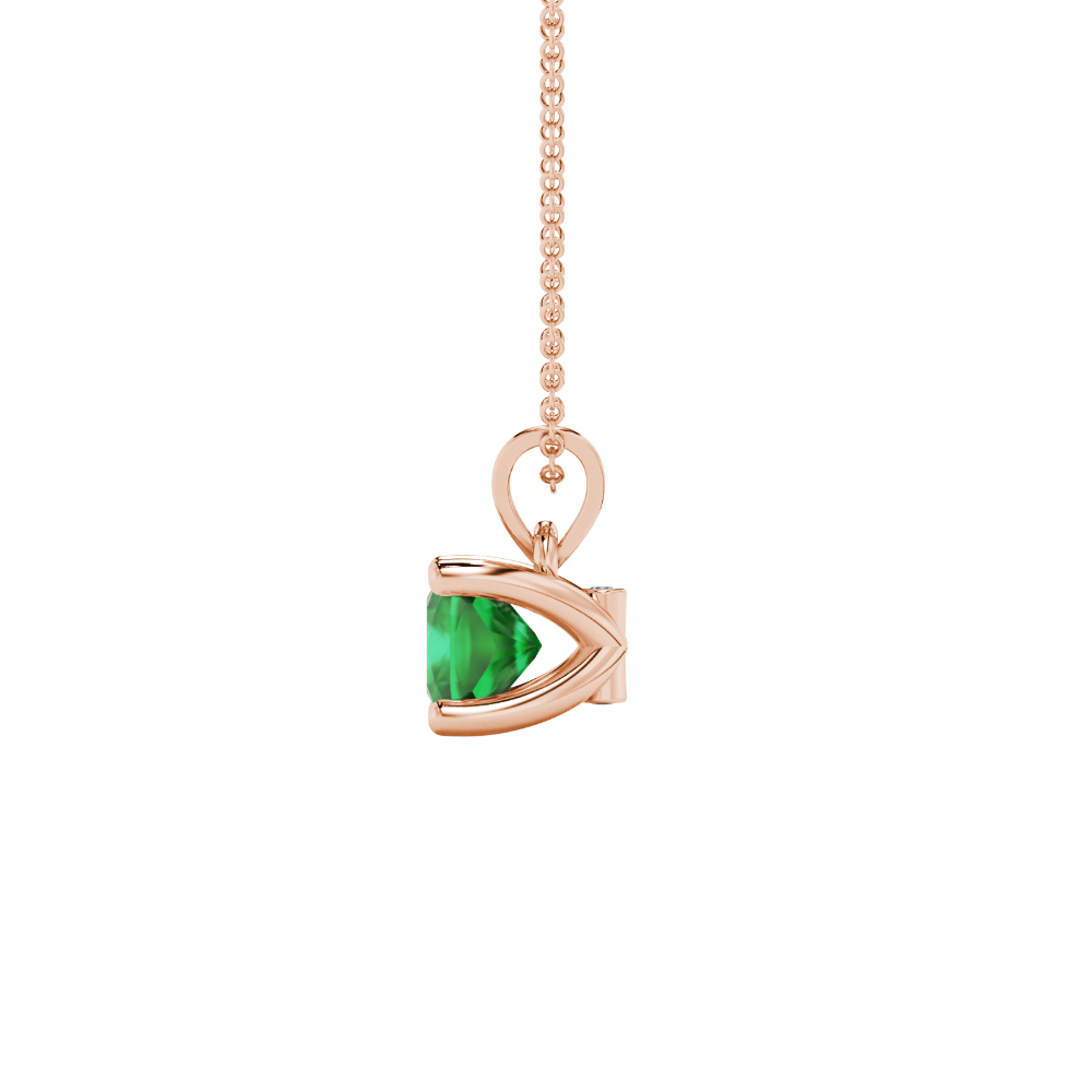 Green cushion cut gemstone pendant with accent diamonds in white gold basket setting