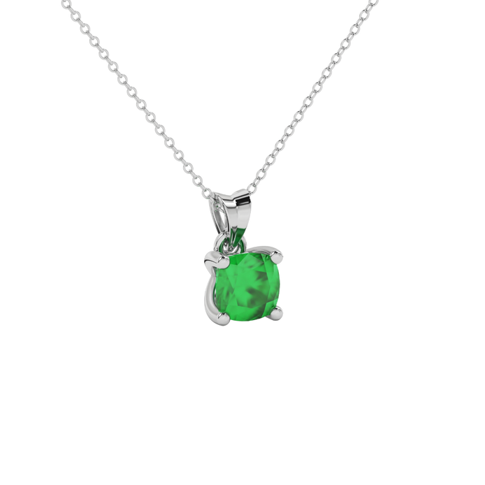 Green cushion cut gemstone pendant with accent diamonds in white gold basket setting