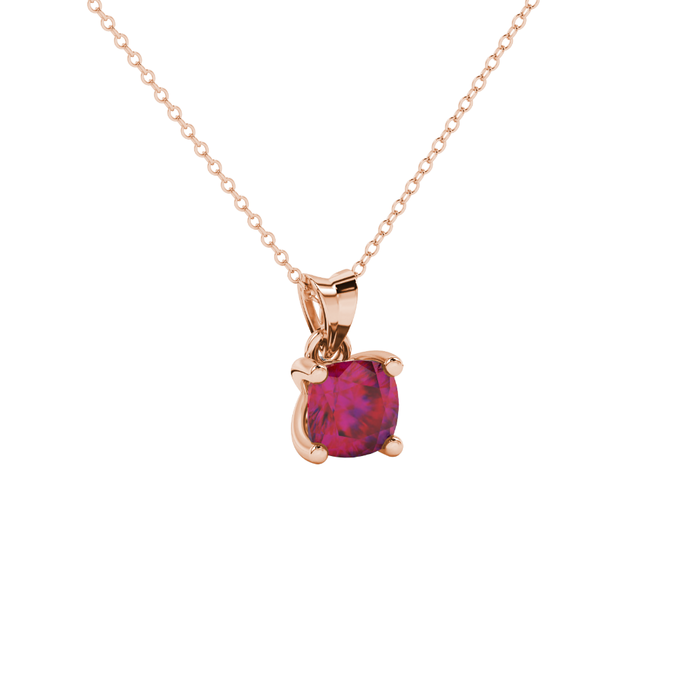 Red cushion cut gemstone pendant with accent diamonds in white gold basket setting