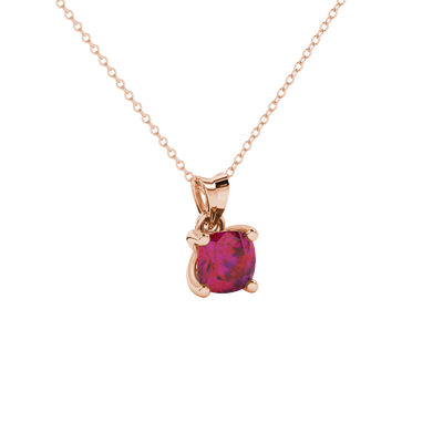 Red cushion cut gemstone pendant with accent diamonds in white gold basket setting