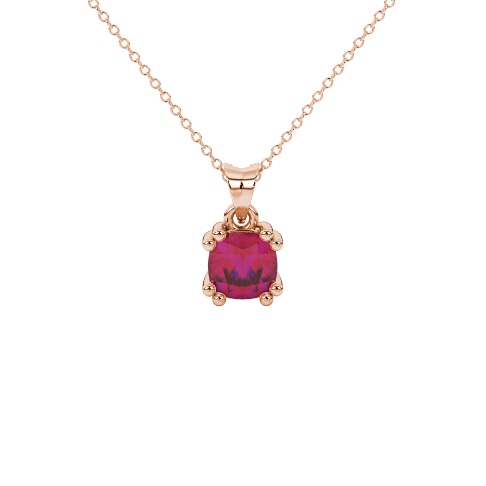 Red cushion cut gemstone pendant in floral crown gold setting